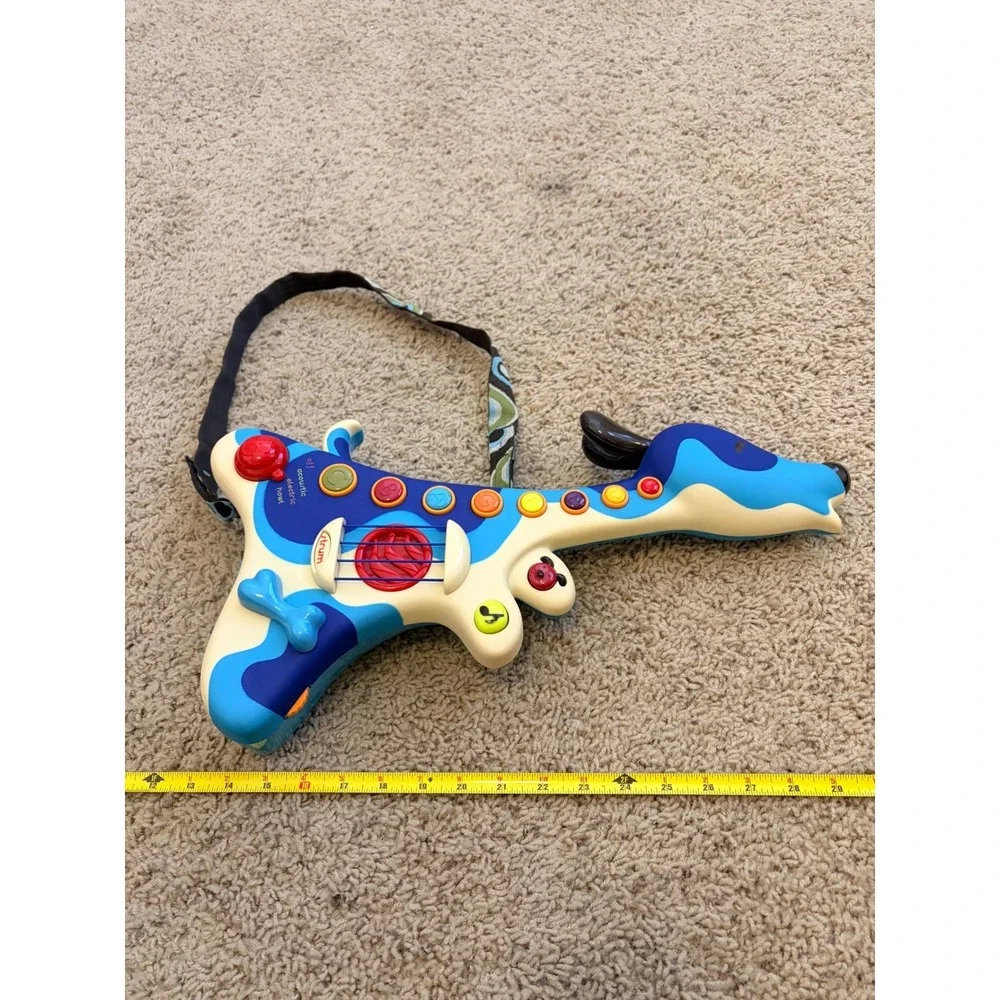B. Woofer Hound Dog Guitar Interactive Music Toy‎